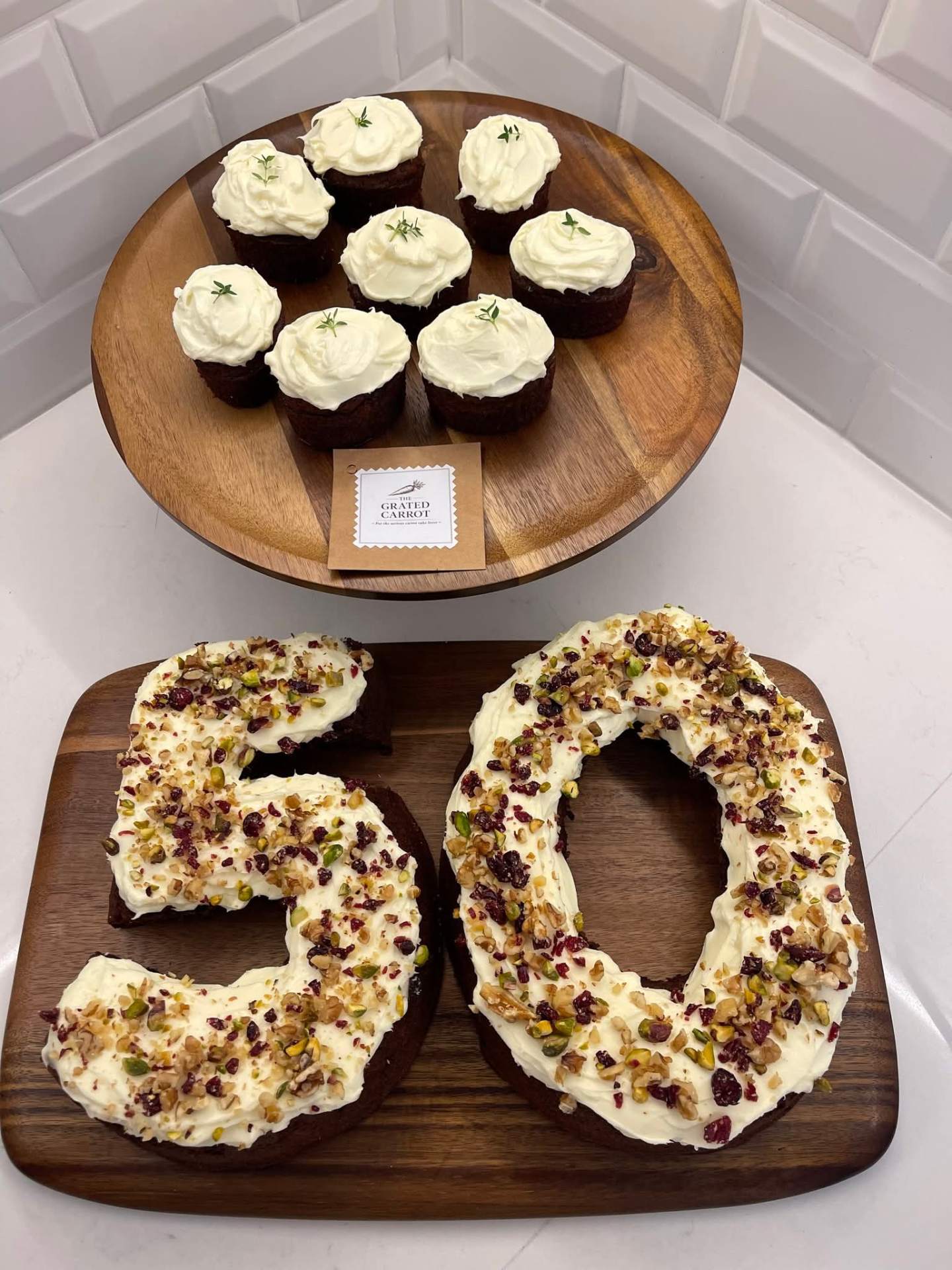 Carrot cake decorated with garden herbs